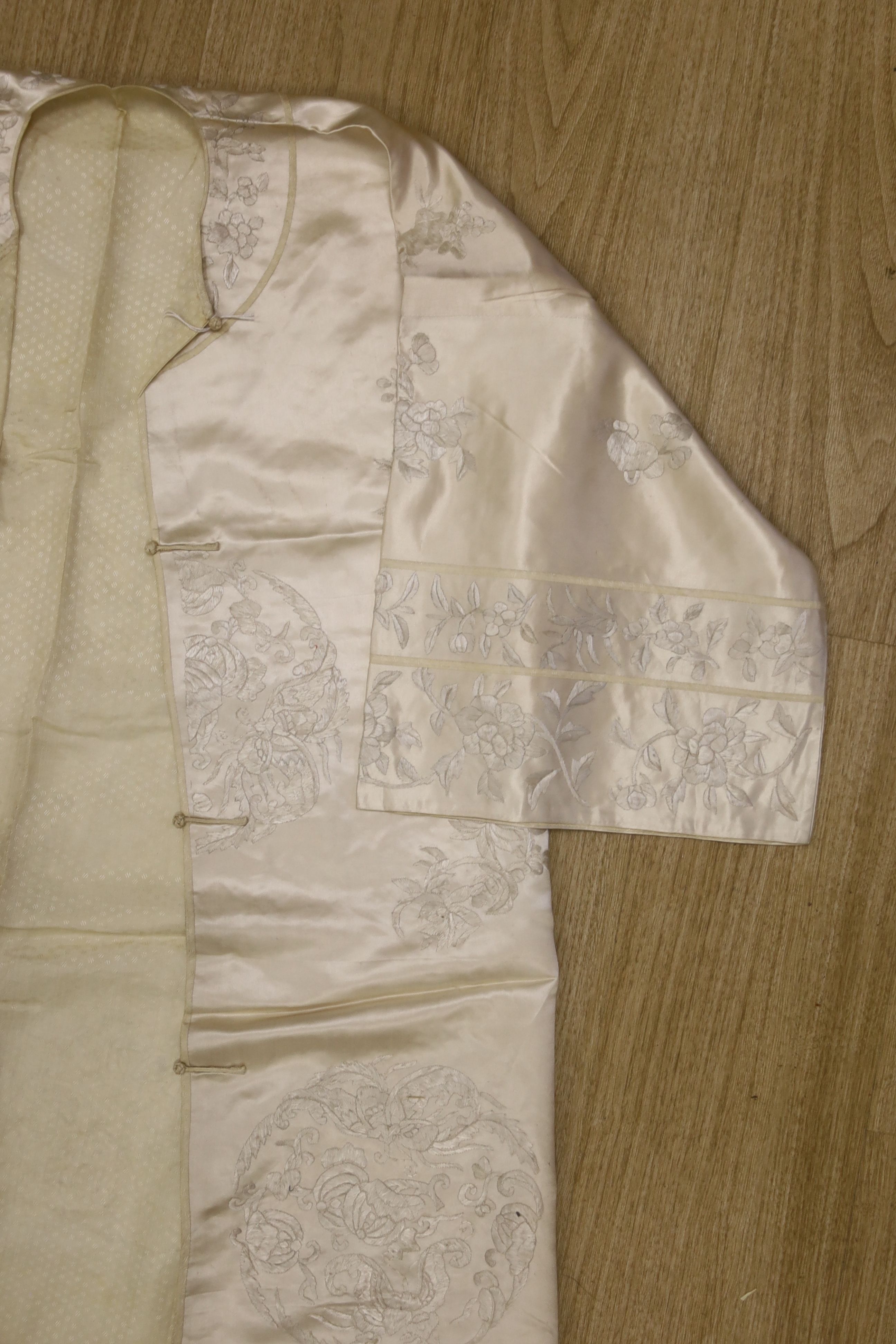 A 1920's Chinese cream silk embroidery on cream silk robe made for the European market, length 111cm